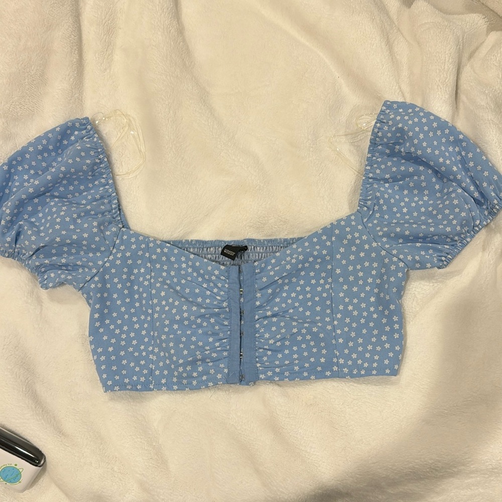 Brand new blue floral shirt.